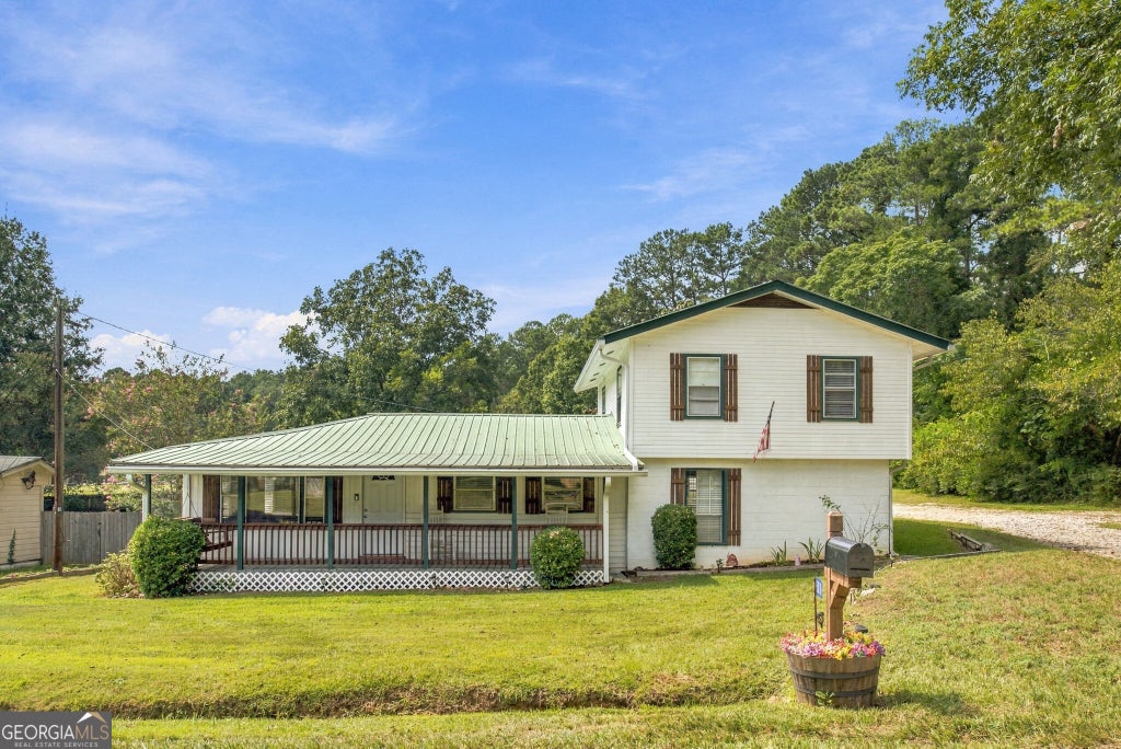 Photo of 3810 Claude Brewer Road, Loganville, GA 30052 (MLS # 10852784)