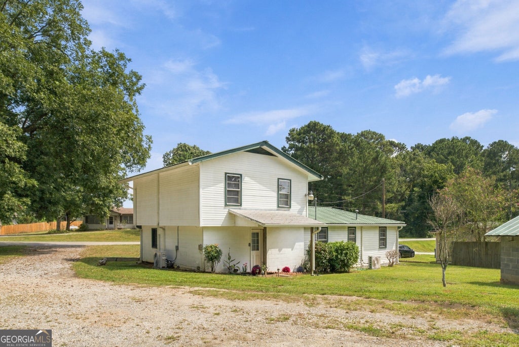 Photo of 3810 Claude Brewer Road, Loganville, GA 30052 (MLS # 10852784)