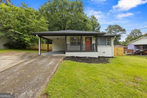 Photo of 1553 McCallie Boulevard NW, Atlanta, GA 30318 (MLS # 10658345)