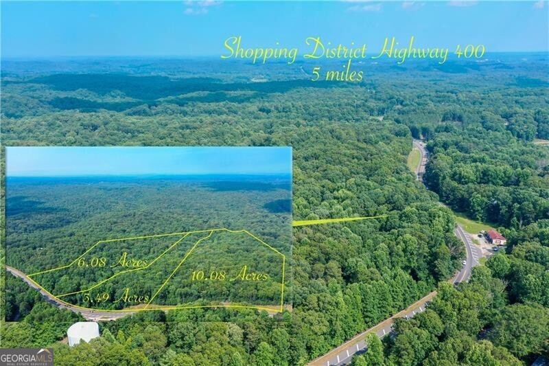 Over 1,300 feet of road frontage on Highway 53, located 2 miles east of downtown Dawsonville and 5 miles west of Highway 400. This property comprises an assemblage of three parcels totaling 19.65 acres, recorded as three individual tracts of land. The sellers prefer to sell all three together but are open to selling the parcels individually. The property offers endless possibilities.