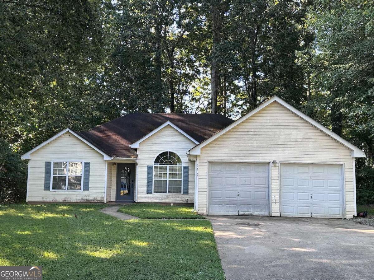 Charming 3 bedroom/two bath ranch home in peaceful Jefferson setting. Large living room with fireplace, formal dining room, eat in kitchen and glass doors leading to the back deck, perfect for entertaining. Large master suite and ensuite offers separate tub/shower and a large walk-in closet. Main level laundry, high ceilings, large lot, desirable location!