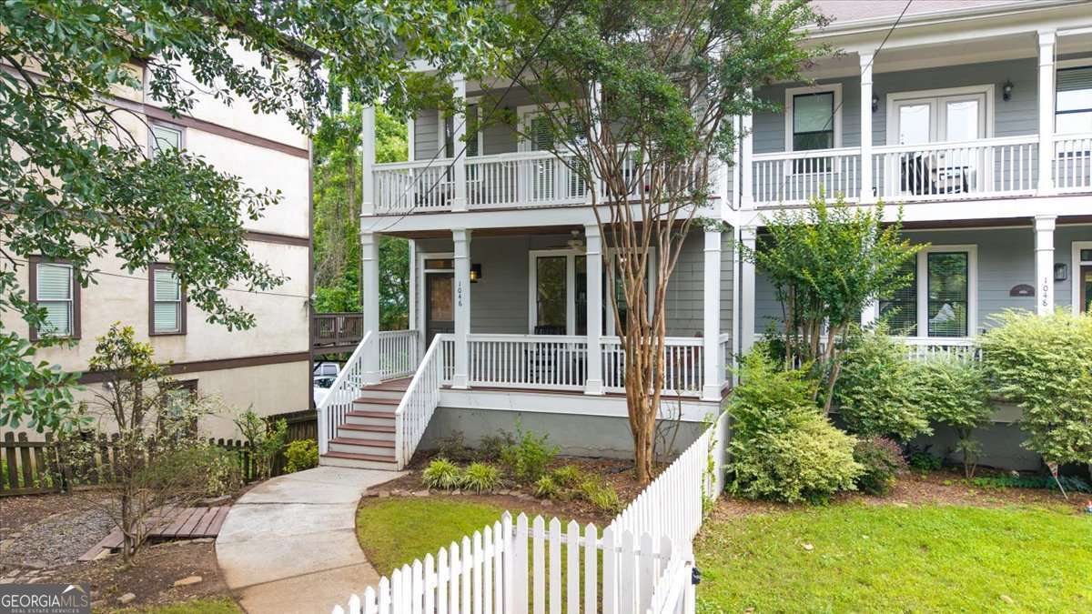 Welcome to your ideal Reynoldstown rental - a Charleston-style gem that blends space, style, and location in all the right ways. This beautifully maintained home offers plenty of room to spread out, including a finished downstairs bonus room perfect for a home office, movie space, or guest suite. Enjoy the convenience of a 2-car garage plus additional off-street parking, a rare find in this popular neighborhood. Inside, you'll love the hardwood floors on the main level, elegant molding, designer paint finishes, and a welcoming Great Room with built-in shelving and a cozy fireplace. Hosting is a breeze with a separate dining room and a gourmet kitchen featuring granite countertops, an entertainer's island, and sleek stainless steel appliances. Outdoor spaces are a true highlight, with two covered front porches and a back deck - perfect for relaxing mornings or evening get-togethers. Upstairs, you'll find three spacious bedrooms, each with upgraded bathrooms designed for comfort and privacy. And when it comes to location? You're less than two blocks from MARTA and the Beltline, putting parks, restaurants, and everything East Atlanta has to offer right at your fingertips. This home delivers flexibility, charm, and unbeatable access!