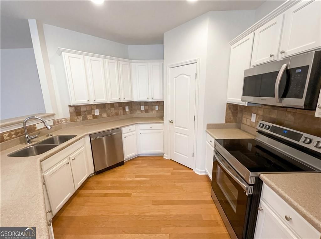 Photo of 2721 Cedar Drive, Lawrenceville, GA 30043 (MLS # 10691424)