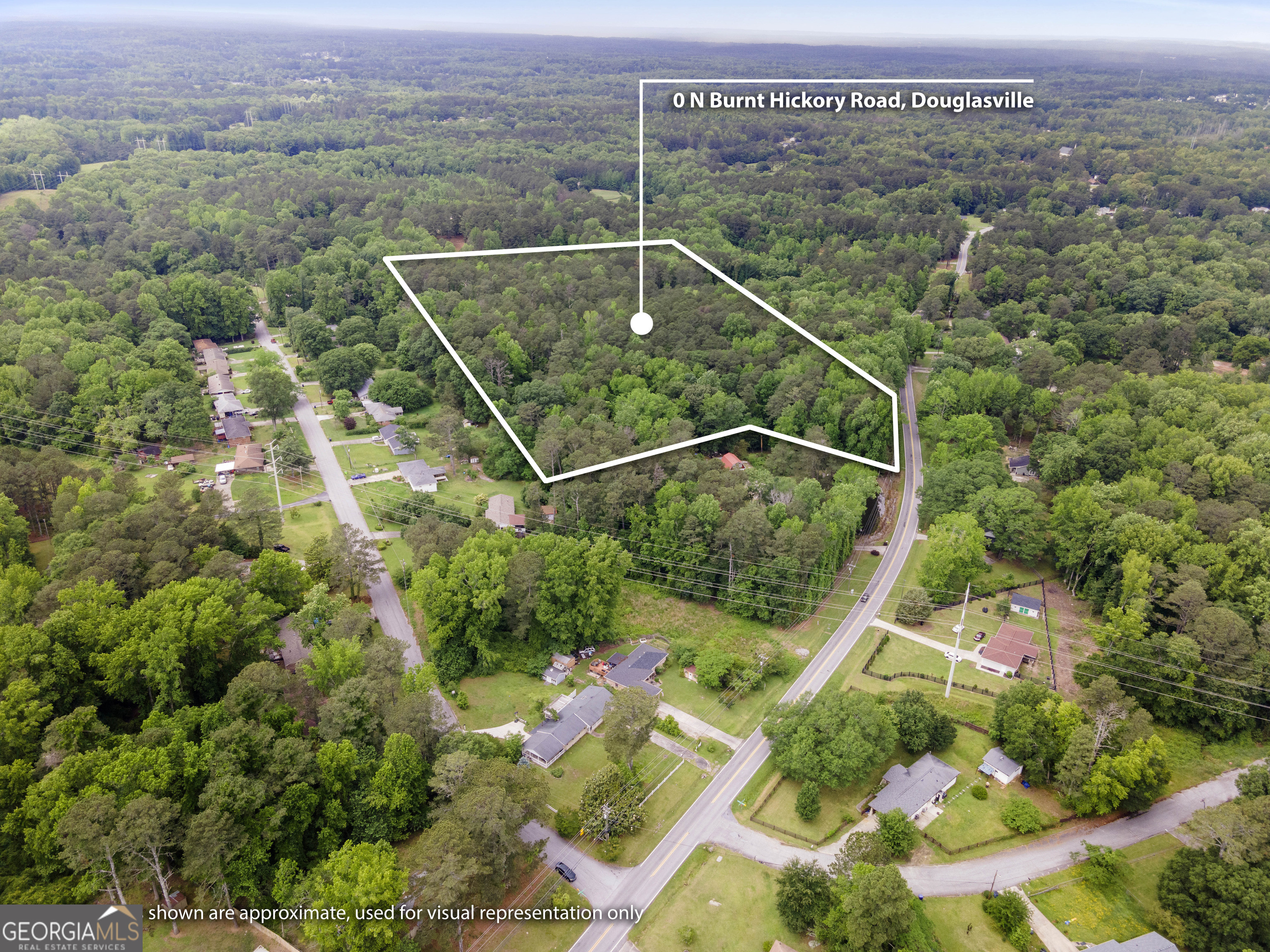 Prime 16.1 acre parcel in Douglasville, zoned residential and ready for your vision! Discover a rare opportunity to own 16.1 acres of untouched, wooded land. This expansive property offers a blank canvas for your dream home, private estate, or potential development. Zoned residential, the possibilities are endless, create your secluded retreat surrounded by nature or explore the potential for a custom built community. Conveniently located with easy access to major highways, shopping, and dining while still providing the peace and privacy of a rural setting. Don't miss the chance to own a piece of Douglasville's natural beauty!