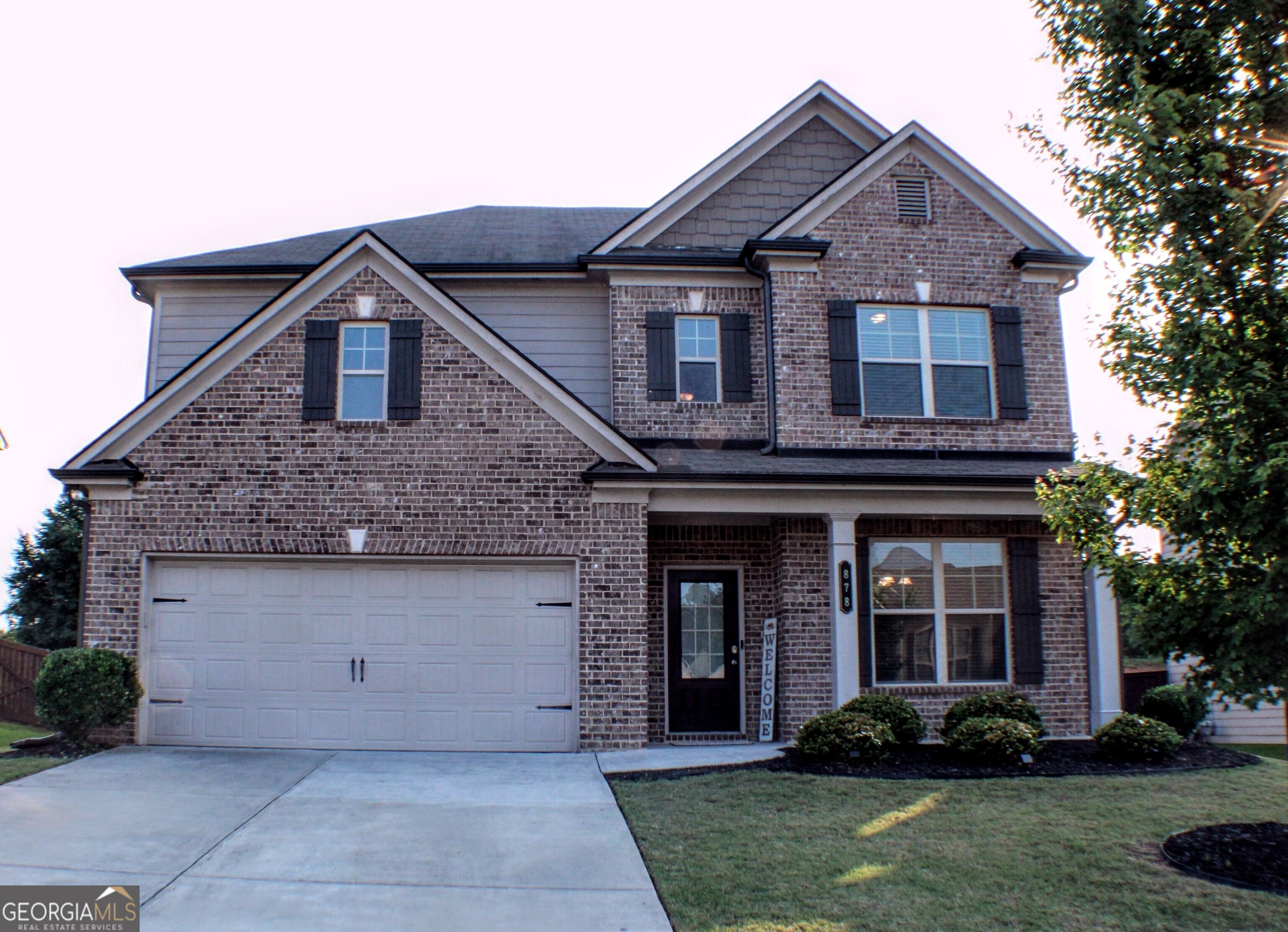 Welcome to this beautiful well-maintained 4bed/2.5bath home! Nestled next to the Little Mulberry Park in the Dacula/Mulberry Cluster. Fresh paint throughout with a like-new construction feel! The interior features a 2-story foyer, formal dining room, office/study with sliding door, family room with coffered ceilings, corner fireplace & large windows that allow natural light to the main level. Chef's eat-in kitchen offers an open concept with a view to the family room, features an island with breakfast bar and overhung pendant lights, granite countertops, and chic backsplash. Mud room off the garage with cubbies& coat racks. Oversized primary bedroom with enough space for a sitting space and features tray ceilings, the ensuite offers granite counter tops, double vanity, separate tub & shower with two large walk-in closets in the primary. Upper level also offers three spacious secondary bedrooms and an additional full bathroom. Covered porch & patio with private fenced yard that is perfect for entertaining year-round. Direct access to Little Mulberry Park Trails and close access to shopping, restaurants, schools, and more! Please use ShowingTime to schedule showings.