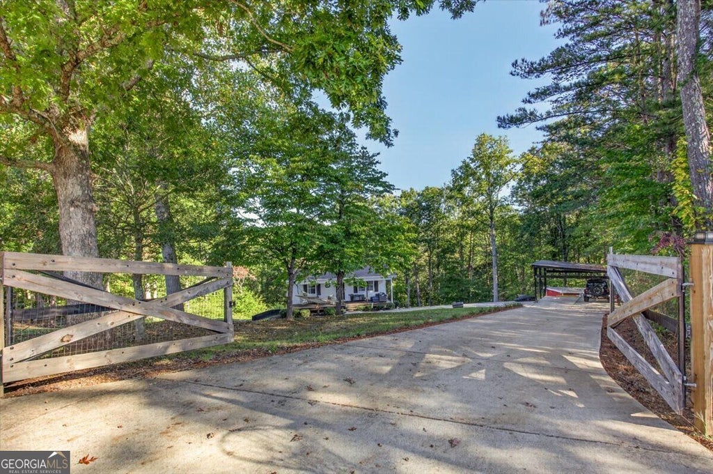 Photo of 1015 Shamrock Lane, Ball Ground, GA 30107 (MLS # 10868332)
