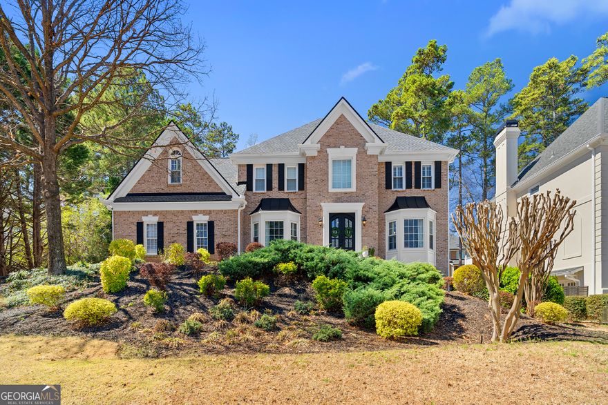 Move in ready luxury home with exceptional features. Every detail has been thoughtfully considered in this stunning, move in ready home. Boasting 3.5 sides of brick, a freshly painted exterior and interior, a new roof, and brand new HVAC systems throughout, this residence is designed for effortless living. The fenced backyard oasis features a pool, hot tub, and Astro turf, offering a low maintenance retreat where you can spend more time enjoying your free time. Inside, you'll find brand new hardwood floors throughout the main and upper levels, custom designer lighting, and a neutral color palette that complements any style. The dedicated home office features built in bookshelves and ample storage. An oversized formal dining room, breakfast room with a picture window, and a screened porch overlooking the pool create perfect spaces for dining and relaxation. A keeping room offers additional versatility, ideal as a playroom or cozy lounge. At the heart of the home, the chefs kitchen is a dream with a 48" Wolf range, Sub-Zero refrigerator, KitchenAid dishwasher and microwave, and oversized island with pull-out drawers throughout, perfect for entertaining. The family room features built in bookcases, a fireplace with new gas logs, and rear staircase access. Upstairs, the owners retreat includes a private keeping room with a fireplace, built in bookcases, and his and hers bathrooms. The spa like bath features a soaking tub, steam shower, double vanities, and abundant natural light. The custom walk in closet provides exceptional storage and organization. A junior suite offers a clawfoot tub, separate shower, and custom built walk in closet. The fully finished basement includes a GE Cafe refrigerator, convection oven, and quartz countertops in the efficiency kitchen. A theater room with plush carpet provides the perfect setting for movie nights, while upgraded LVP flooring, a multipurpose room, and a showroom finished storage space add function and style. The basement also offers direct access to a private courtyard and the backyard pool area. Located in an active swim/tennis community, the HOA includes weekly trash service and a busy social calendar. With extensive upgrades, including new HVAC systems, this home is a must-see for discerning buyers.
