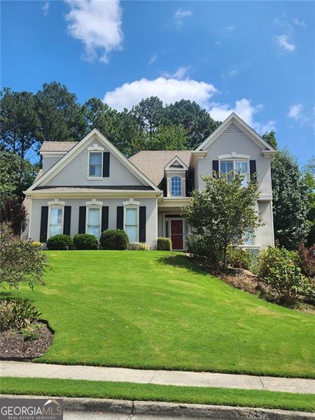 Welcome to your dream home in Hamilton Mill, one of Dacula's sought-after communities known for its family-friendly atmosphere, resort-style amenities, and award-winning schools! This stunning residence offers 4 bedrooms, 3.5 bathrooms, and a full finished basement. The main level has beautiful hardwood floors, and features an oversized primary retreat. The spa-like primary bath includes a luxurious free-standing soaking tub, frameless glass shower, and dual vanities. The gourmet eat-in kitchen is a chef's delight, boasting granite countertops, abundant cabinetry, a coffee station, and a stylish tiled backsplash. A 12+ seat dining room makes entertaining a breeze. The living room feels bright and spacious with soaring ceilings and expansive windows overlooking the backyard, complemented by plantation shutters found throughout the main floor. Step outside to your own oasis - a Trex deck, fenced backyard, and beautifully landscaped grounds - perfect for relaxing or hosting gatherings. The spacious finished basement truly sets this home apart! It includes a kitchenette, living and dining areas, a laundry room, plus two additional bonus rooms that can easily serve as bedrooms, offices, or hobby spaces. The sheer size of this basement means you have all the room you need for multi-generational living, guests, or recreation. Living in Hamilton Mill means more than just owning a home - it's a lifestyle. Residents enjoy a vibrant community with a clubhouse, two pools, tennis and pickleball courts, volleyball and basketball courts, playgrounds, walking trails, and year-round events. With easy access to shopping, dining, and major highways, you'll love the convenience as much as the amenities. This home truly offers the best of space, style, and community living!