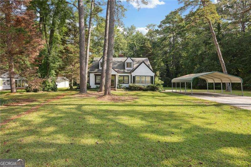 Photo of 30 Woodlawn Avenue, Hampton, GA 30228 (MLS # 10771673)