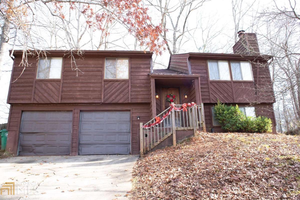 Great Opportunity to live in a well sought after community in Stone Mountain. Spacious split level floor plan with large fenced backyard. Property has lots of potential and needs TLC. Close access to amenities and highways. Great for first time home buyers or investor looking to create a portfolio. Don't miss this deal!!