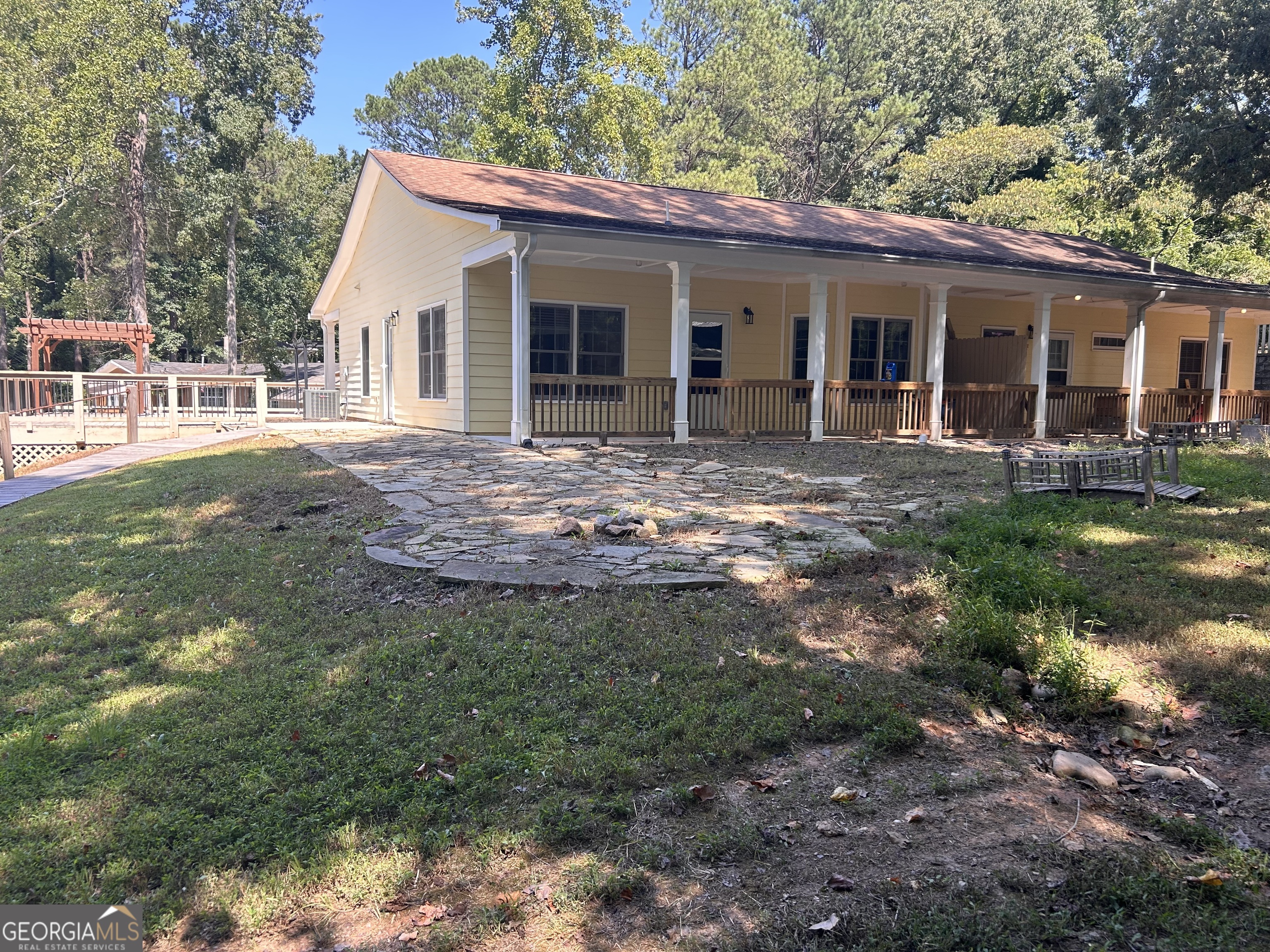 Available to show August 3rd, 2025. Utilities are included. Set in a quiet, private setting, minutes from lake Allatoona. This home has two bedrooms, spacious open floor plan, large yard, and lots of parking. Hardwood laminate floors throughout, bright white, extra tall kitchen cabinets, and stainless steel appliances with washer n dry included. Showings scheduled by appointments only. Interior pictures coming soon.