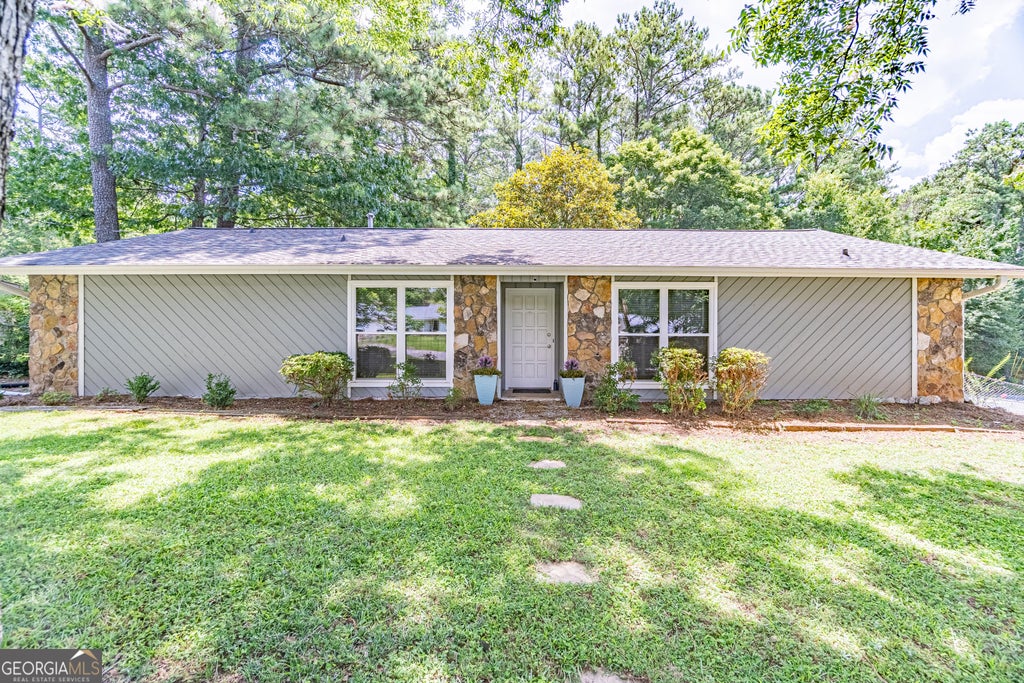 Photo of 3274 Kimberly Woods Court SW, Lilburn, GA 30047 (MLS # 10803752)
