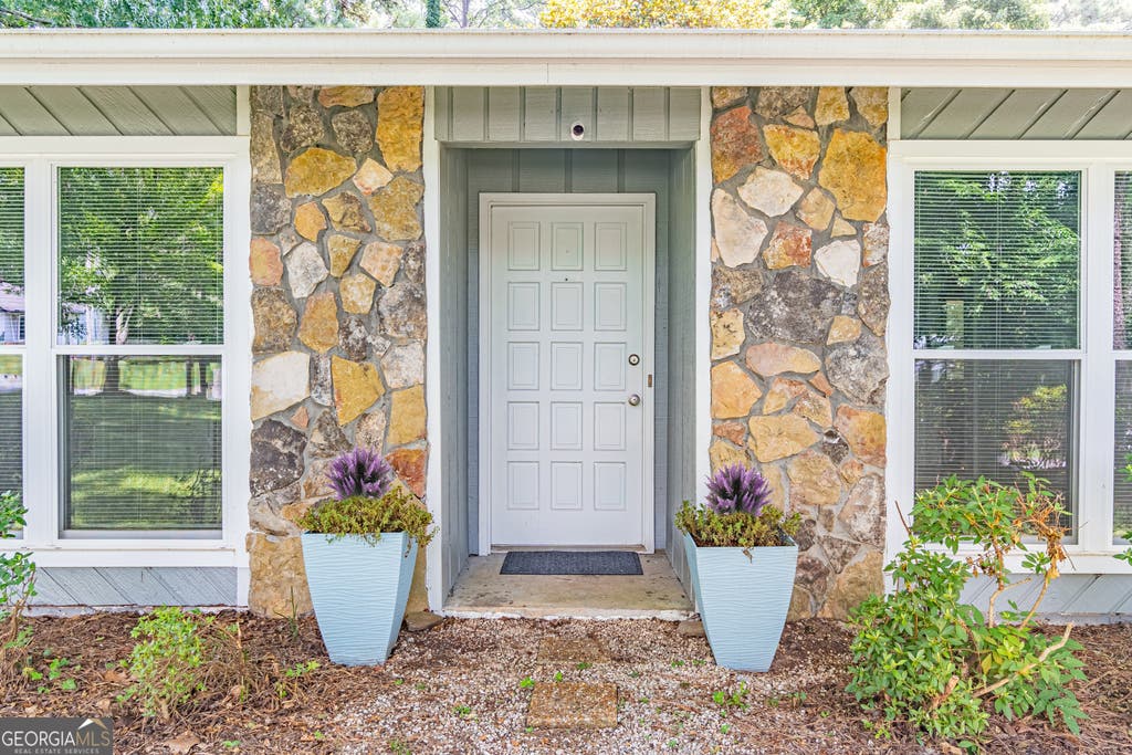 Photo of 3274 Kimberly Woods Court SW, Lilburn, GA 30047 (MLS # 10803752)