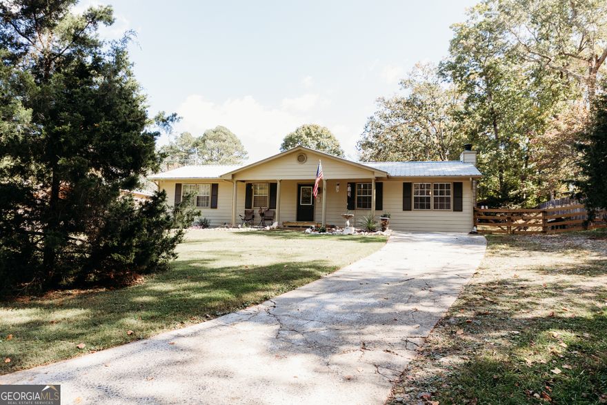 Welcome home to this beautiful house at the end of the street. In the very sought after South Forsyth area. 10min drive to multiple malls, but still a quiet setting on the back porch. This home offers 3 bedrooms, 2 full bathrooms and an optional office or bonus room. Hardwood floors throughout, wood burning fireplace in the living room, electric stove, dryer, water heater and HVAC with gas hookups at each. Beautiful fenced in back yard with a shop and multiple outbuildings. Large enough area for the kids to play and have a garden at the same time. No HOA. RECENT APPRAISAL ON HAND.