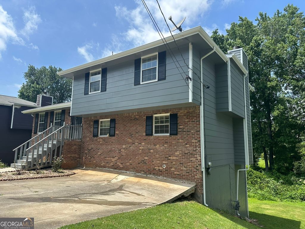 Photo of 1926 Old Rex Morrow Road, Morrow, GA 30260 (MLS # 10776234)