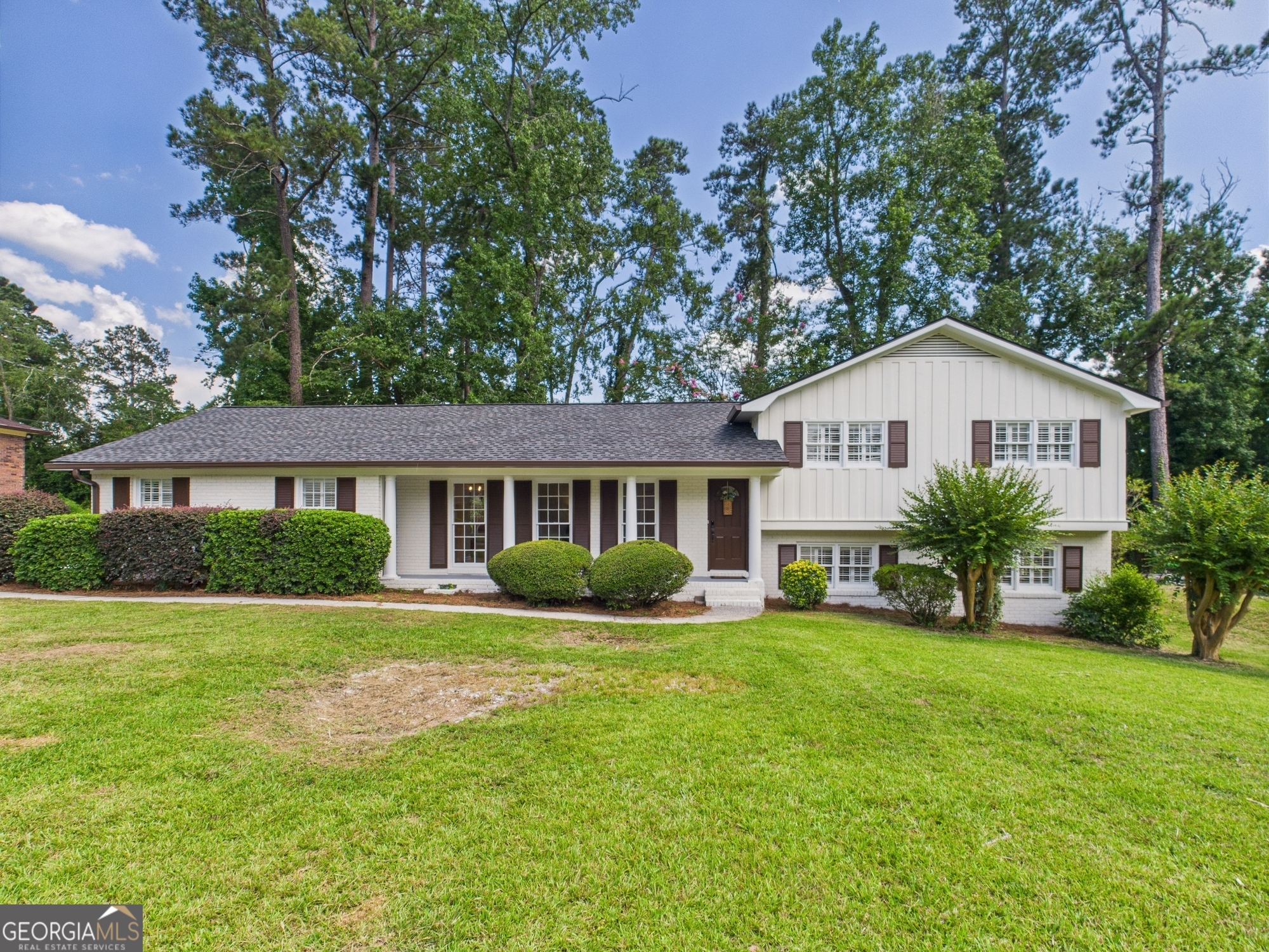Welcome to this spacious and charming brick tri-level home located in the heart of Macon, Georgia-just minutes from plenty of shopping, dining, and everyday conveniences. This 5-bedroom, 3-bathroom home offers a versatile floor plan with room for everyone, featuring an abundance of natural light and modern smart home technology for added comfort and ease. Step inside to find a beautiful galley kitchen with sleek finishes and plenty of cabinet space, ideal for preparing meals and entertaining guests. The home includes multiple living areas, an office perfect for remote work, a playroom, or additional flex space to fit your needs. Enjoy the outdoors year-round with an amazing back porch that overlooks a large, partially fenced-in backyard-perfect for play, pets, or gardening. A handy garden shed adds extra storage for tools and supplies. This home combines space, functionality, and location-don't miss your chance to own this gem in a well-established area of Macon!
