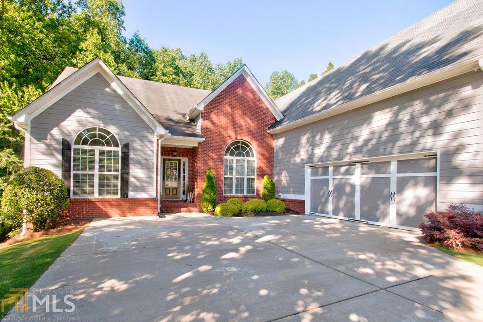 Beautiful, move in ready, large home over a full unfinished BASEMENT. Room for the whole family! NEW ROOF with a transferable life time warranty on the Architectural shingles just installed. Fresh paint indoors and outdoors, new flooring in the oversized master suite which boast dual vanities, a walk in closet, standup shower and a garden tub. Formal Dining Room, plus a flex space with vaulted ceilings that could make a beautiful office or playroom. Two additional bedrooms and a bath on the main. Large bonus room with a full bathroom upstairs. Beautifully landscaped backyard with a fire pit, automatic lighting and a shaded canopy, perfect place for the kids to play! Located within minutes to Lake Lanier, dining and shopping. Please call or text to tour