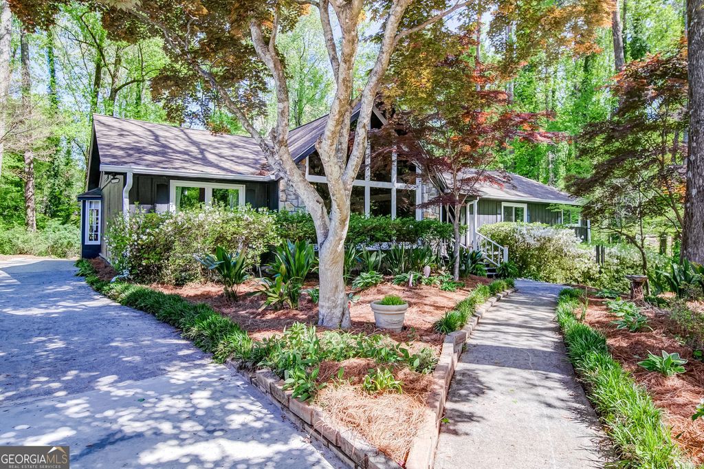 Photo of 4587 Town Crier Road SW, Lilburn, GA 30047 (MLS # 10717900)