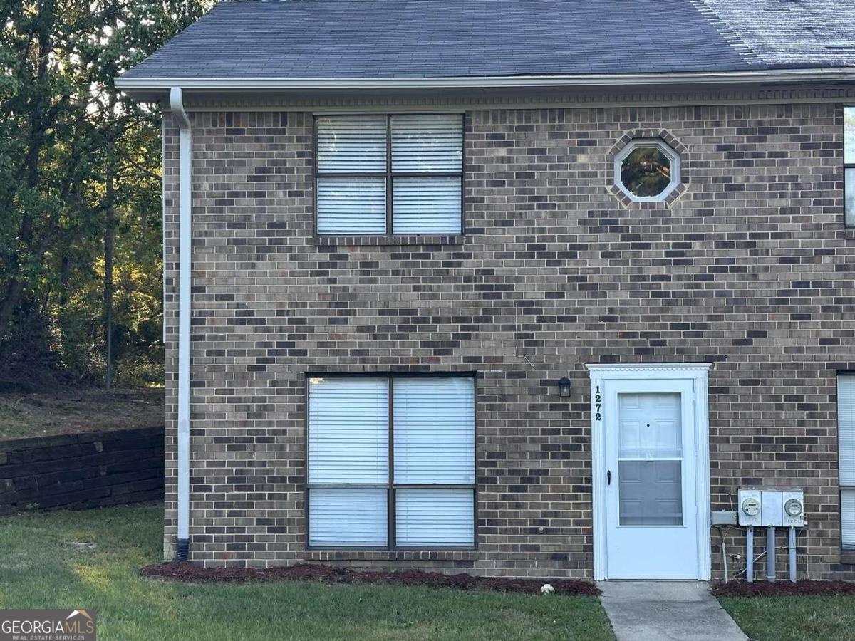 Charming 2-bedroom, 2.5-bath townhouse convenient to everything, located in the heart of Conyers. Spacious 1,200 sq ft layout featuring a roommate and family friendly floor plan. Well maintained and tastefully refreshed with updated gourmet kitchen with all new stainless steel appliance package, freshly painted, new luxury laminate flooring, new carpet, upgraded modern bathrooms. Serene primary bedroom suite features plush carpet, walk-in closet, new modern en-suite bath with double vanity and spa shower. Spacious secondary bedroom features walk-in closet, modern en-suite bath. Located just minutes from Old Town Conyers, shopping, dining, schools, and medical facilities. Perfect for both homeowners and investors. No HOA.
