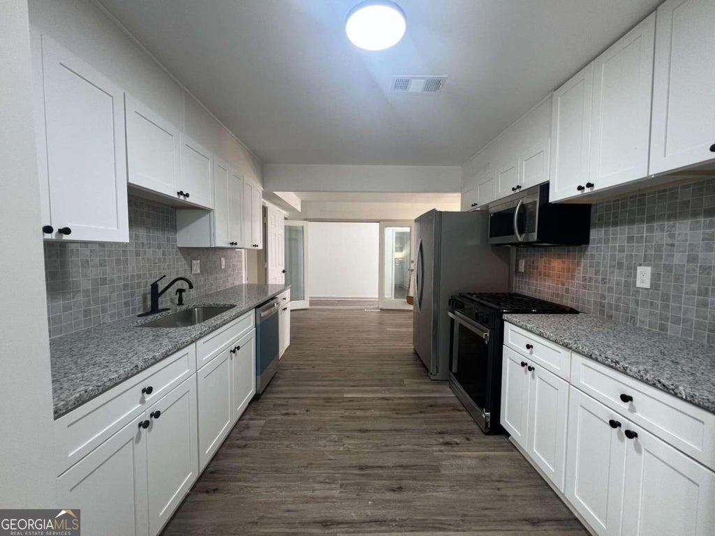 Photo of 5760 Penfield Place, Atlanta, GA 30349 (MLS # 10870919)