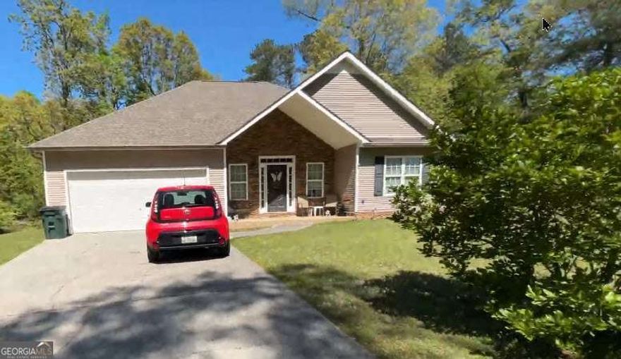 Welcome to this charming, custom-built home where quality meets comfort! From the moment you walk in, you'll notice the spacious open floor plan and gorgeous real hardwood floors that flow throughout-no carpet, no steps, just effortless living.  Designed with care and attention to detail, every room in this home is oversized and thoughtfully laid out. Each bedroom boasts its own private en-suite bath and a huge walk-in closet-yes, even king-sized beds fit with ease! The master suite features stunning vaulted ceilings, while the great room offers soaring cathedral ceilings that make the space feel even more open and airy.  Located in the highly sought-after Sonoraville School District, this gem is perfect for retirees or anyone looking for a quality-built, low-maintenance home.  Don't miss your chance to make this exceptional property your own!