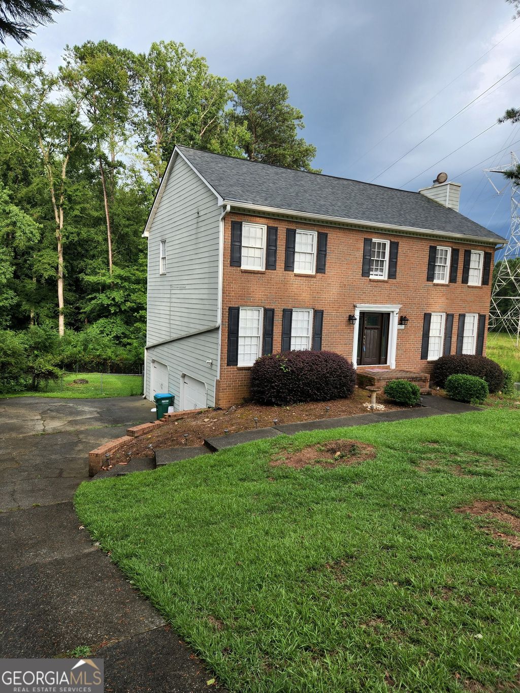 Photo of 4656 Chimney Rock Drive SW, Lilburn, GA 30047 (MLS # 10730161)