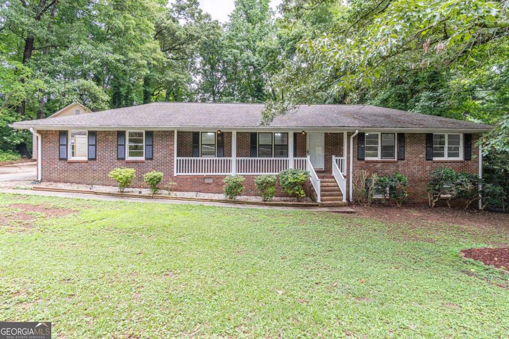 Photo of 5022 Green Oak Drive SW, Lilburn, GA 30047 (MLS # 10772879)
