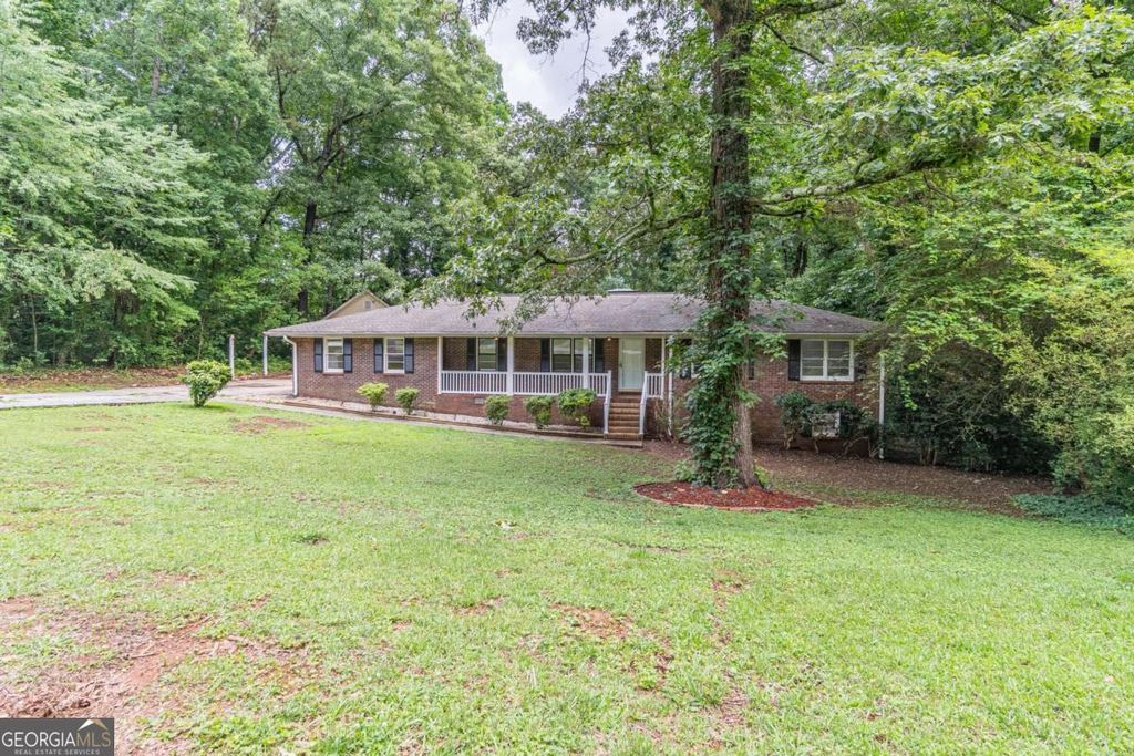Photo of 5022 Green Oak Drive SW, Lilburn, GA 30047 (MLS # 10772879)