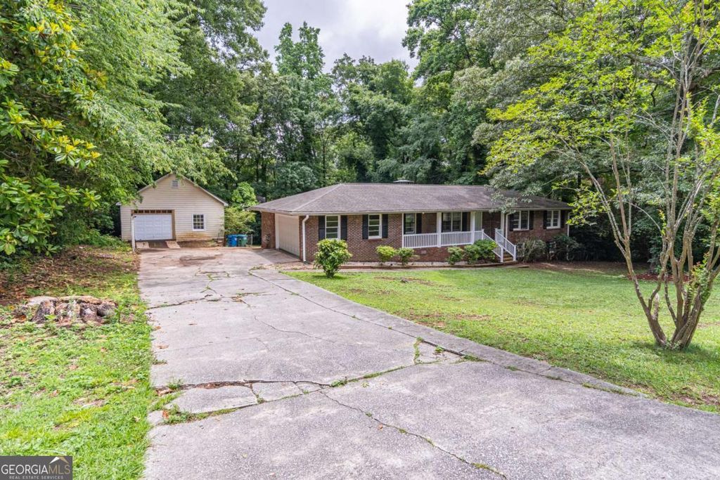 Photo of 5022 Green Oak Drive SW, Lilburn, GA 30047 (MLS # 10772879)