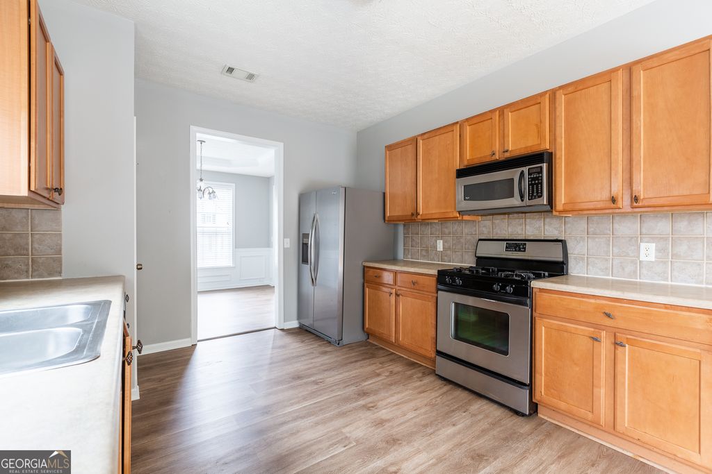 Photo of 3290 Cooper Woods Drive, Loganville, GA 30052 (MLS # 10722289)