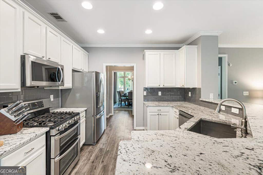 Photo of 3422 Blaisdell Road, Buford, GA 30519 (MLS # 10834632)