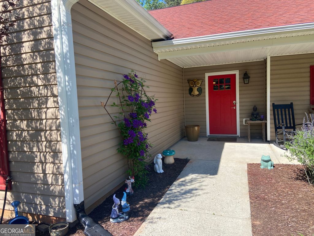Photo of 879 Hawk Creek Trail, Winder, GA 30680 (MLS # 10729857)