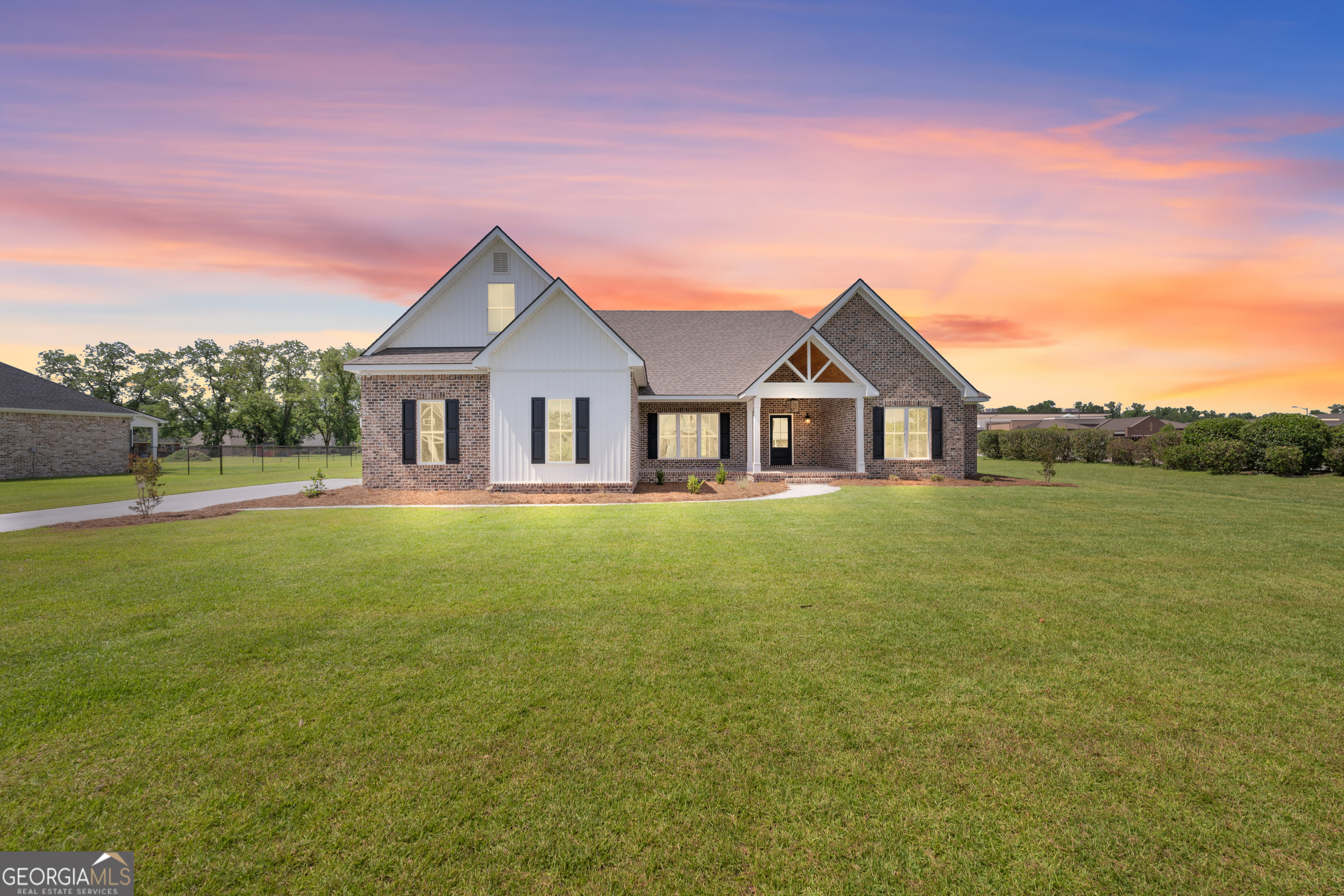 BEAUTIFULLY CRAFTED NEW CONSTRUCTION HOME! Welcome to this beautifully crafted 5-bedroom, 4.5-bathroom home on a spacious 0.61-acre lot, built by Heritage Homes of GA-recently featured on Bloomberg TV as the World's Greatest Home Builder. With 2,771 square feet of thoughtfully designed living space, this home combines timeless curb appeal with exceptional modern finishes. Inside, you'll find a spacious main living area with vaulted ceilings and a charming brick gas log fireplace. The chef's kitchen features a large island, stainless steel appliances, and a sleek tile backsplash-ideal for entertaining or daily life. Retreat to the luxurious primary suite with a spa-inspired bathroom, complete with a tile shower and freestanding soaking tub. The upstairs bonus room includes a full bath and closet, making it the perfect flex space for guests, a home office, or media room. From the welcoming front porch to the quality craftsmanship throughout, this home offers comfort, elegance, and functionality in one beautiful package.