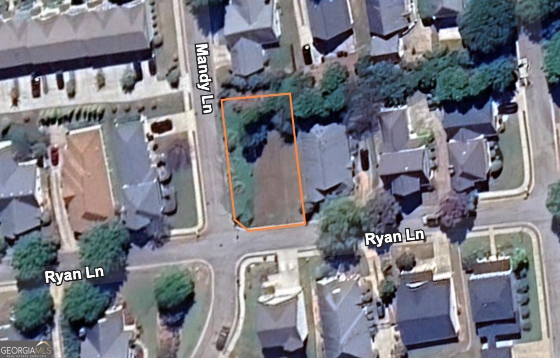 Discover the perfect setting for your future home on this 0.14-acre corner lot in the sought-after Orchard Park Subdivision of Covington, GA. Nestled within a beautifully maintained HOA community, this level, cleared lot is truly build-ready with paved access and nearby availability of power, water, and sewer. Enjoy the peace of a serene neighborhood while staying close to shopping, dining, and convenient access to HWY 20. Whether you're planning your forever home or a smart investment, this property offers the ideal combination of comfort, convenience, and community charm.