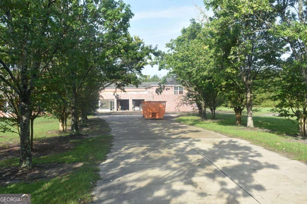 Photo of 255 Archer Road NE, Ludowici, GA 31316 (MLS # 10827639)