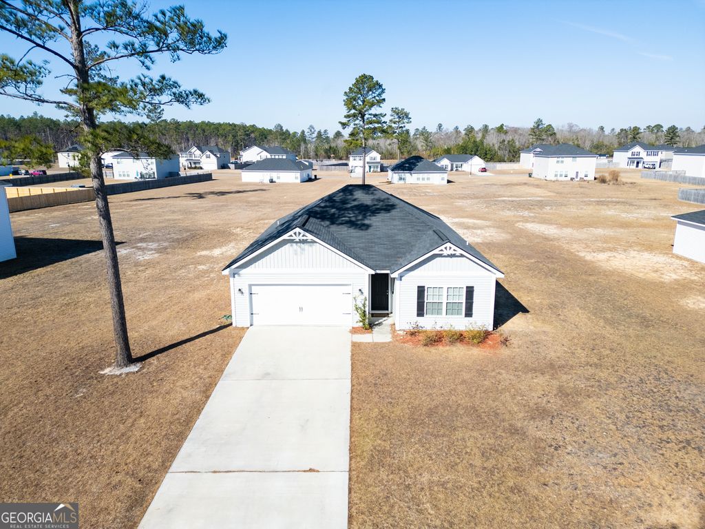 Photo of 291 Morgan Field Boulevard NE, Ludowici, GA 31316 (MLS # 10690827)