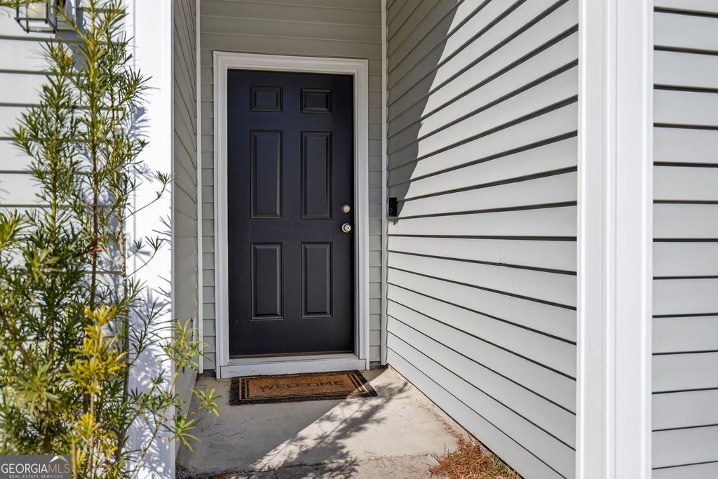 Photo of 291 Morgan Field Boulevard NE, Ludowici, GA 31316 (MLS # 10690827)