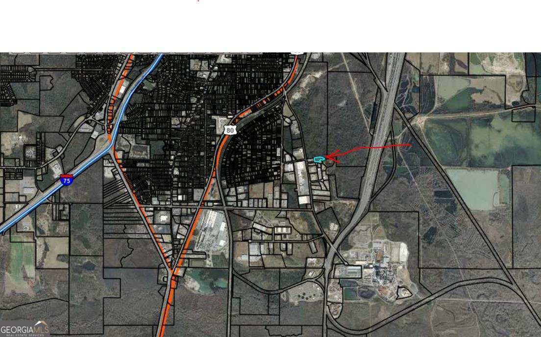 Zoned M-2 Multi-Use Industrial Lot. Fenced. Easy access to Eisenhower Expressway, I-75, I-16 and I-475