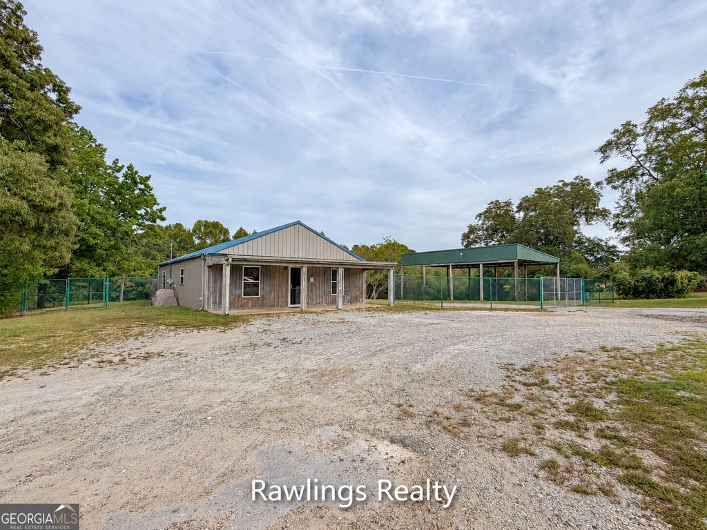 Photo of 1041 Old Hwy 41, Milner, GA 30257 (MLS # 10871397)