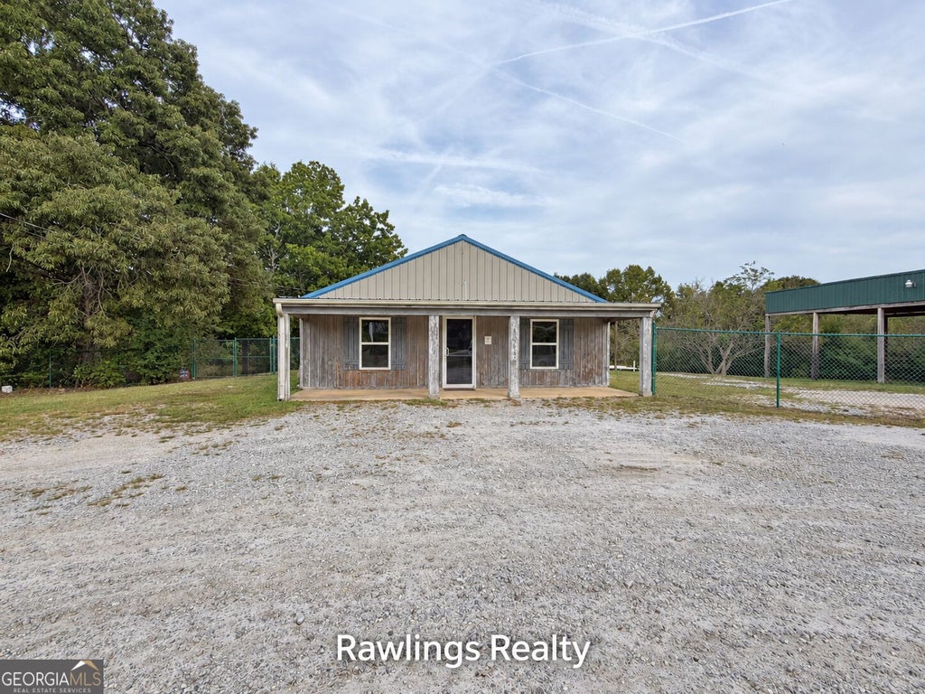 Photo of 1041 Old Hwy 41, Milner, GA 30257 (MLS # 10871397)