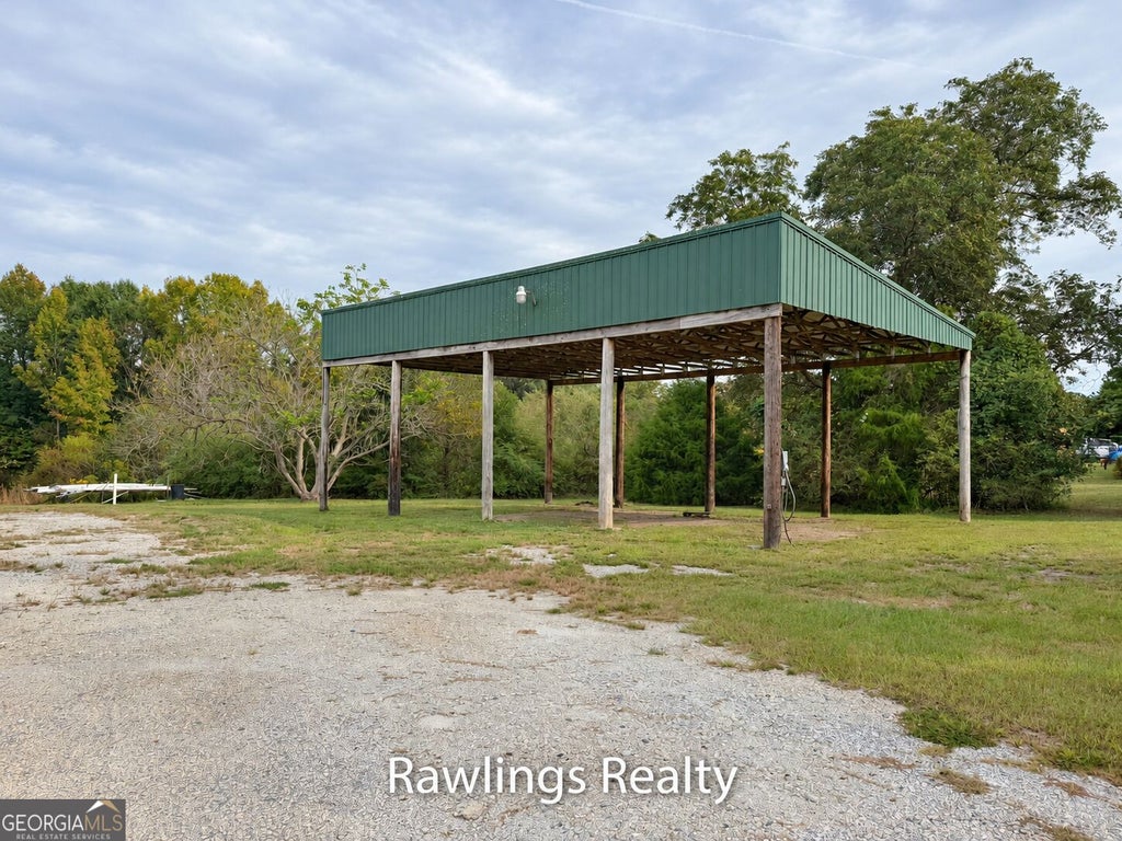 Photo of 1041 Old Hwy 41, Milner, GA 30257 (MLS # 10871397)
