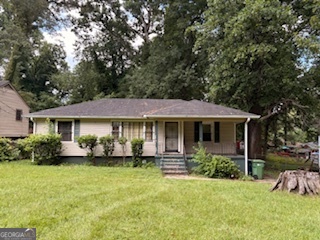 Calling all investors! This solid 3 bedroom, 1 bath home is located in a well-established, older neighborhood and is full of potential. Features include: Hardwood floors throughout A spacious bonus room off the kitchen perfect for expansion or entertaining An unfinished basement ready for your vision Strong bones and classic charm This is a fantastic opportunity to renovate, rent, or flip. Don't miss your chance to build equity in a growing area!