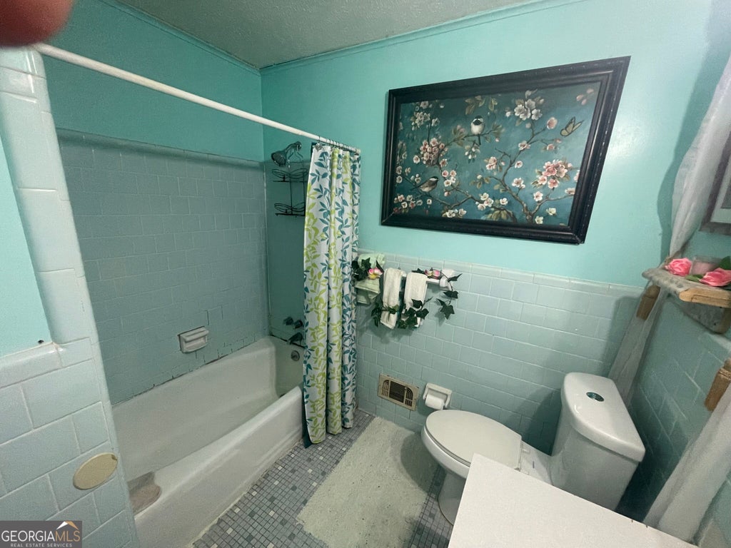 Photo of 622 Fayetteville Road, Jonesboro, GA 30236 (MLS # 10854714)