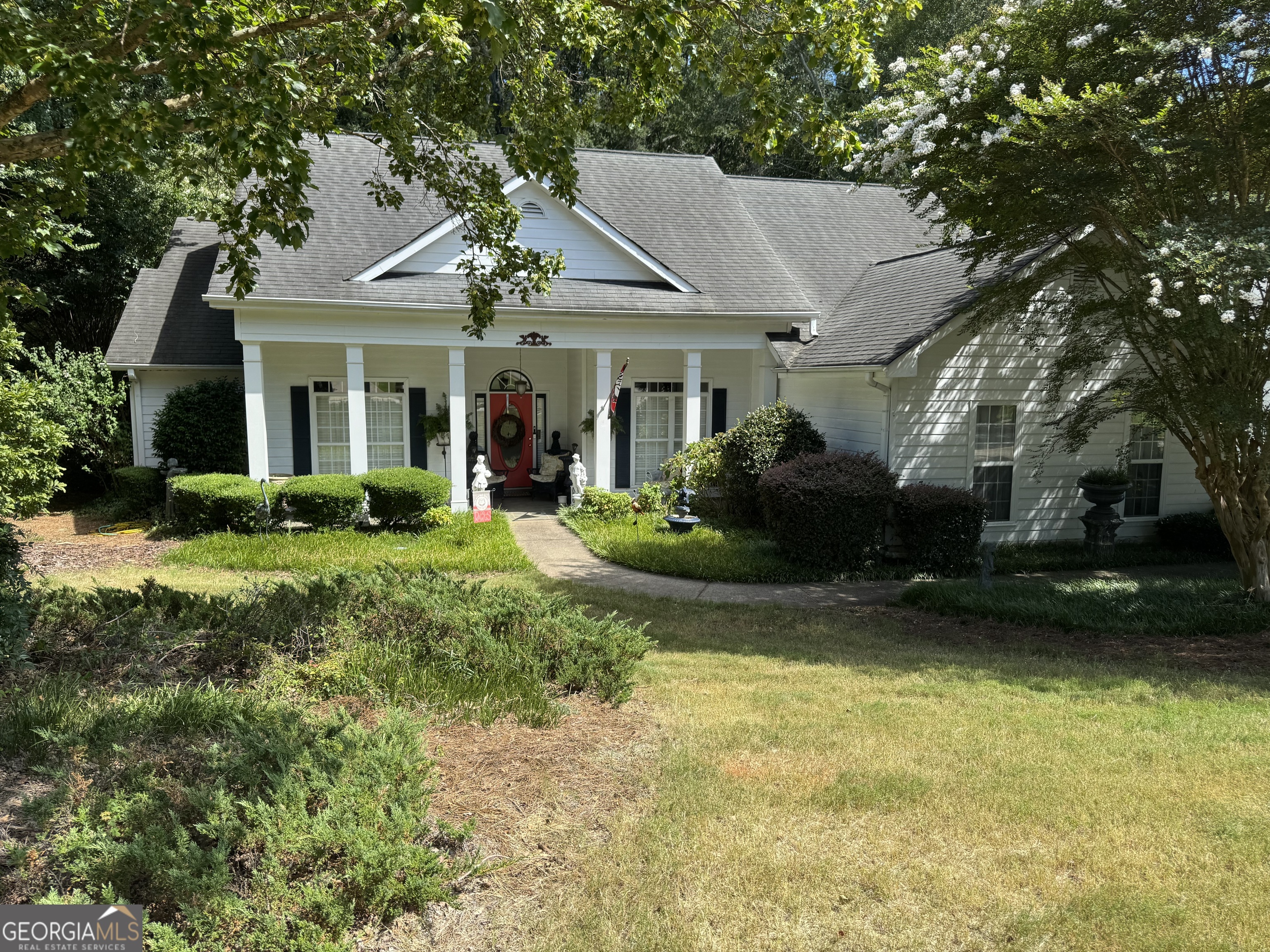 Welcome to this charming Southern Traditional Ranch-style home, perfectly situated just 5 minutes from downtown Monroe. Nestled in a picturesque neighborhood filled with mature hardwoods and timeless appeal, this residence offers both comfort and convenience. The thoughtfully designed split-bedroom floor plan features a spacious primary suite complete with a large en-suite bathroom. You'll also find a formal dining room, a generous utility/laundry room, and a versatile office space ideal for working from home, hobbies, or even a guest room. From the moment you step inside, the soaring ceilings and open layout create an elevated sense of space and luxury. This home truly combines elegance with functionality - perfect for both everyday living and entertaining.