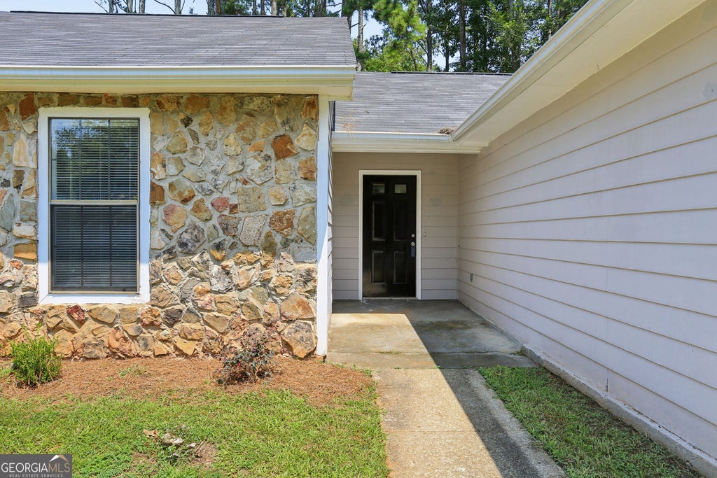 Photo of 819 Arbor Hill Drive, Stone Mountain, GA 30088 (MLS # 10826011)