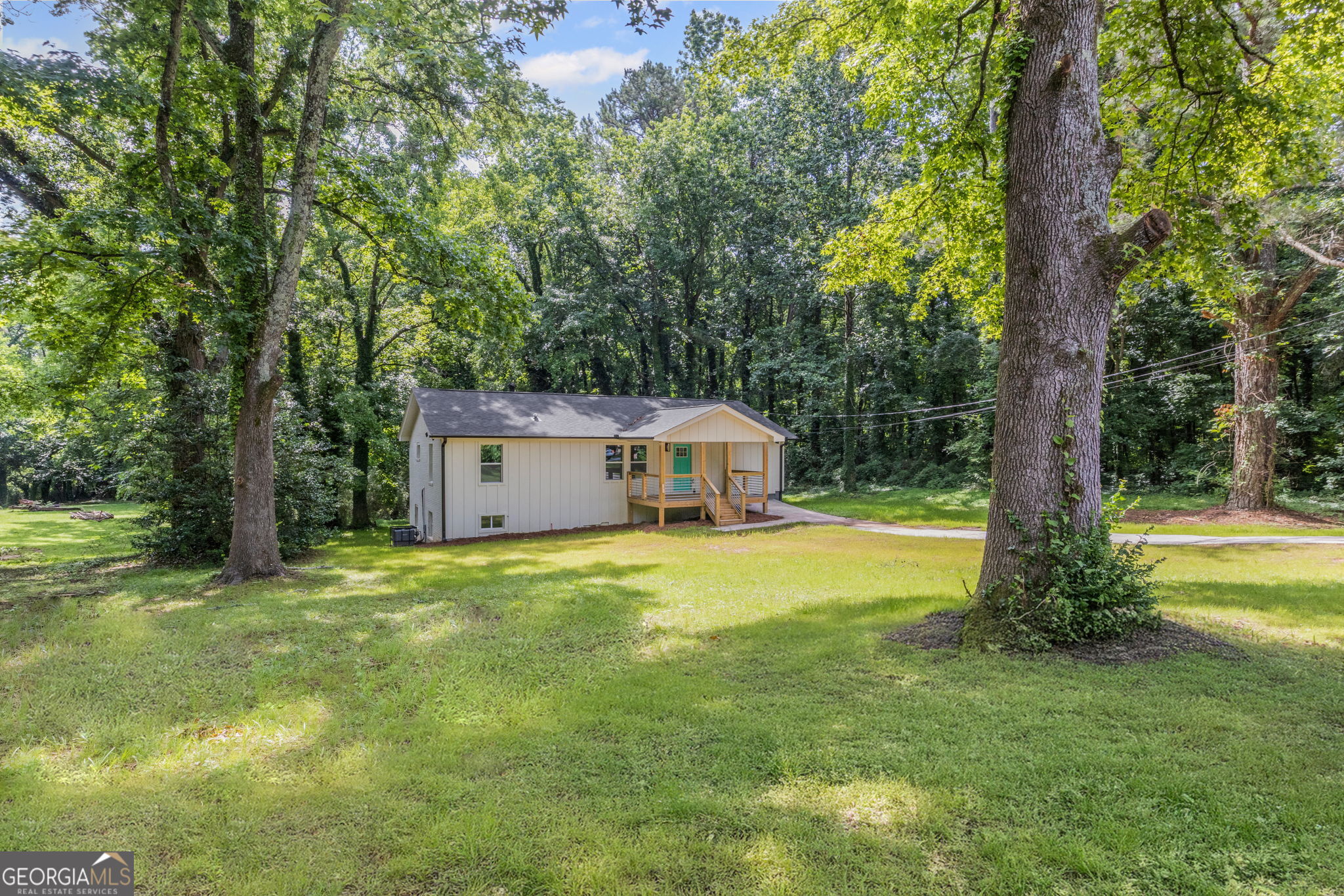 This property showcases a meticulously renovated layout that includes five spacious bedrooms and three and a half bathrooms, set on just over one acre of land. It features expansive front and back yards and is situated in the serene Ben Hill Trace neighborhood. This residence is ideal for multi-generational living and growing families. Additionally, it is conveniently located near downtown Atlanta, offering a variety of dining, shopping, and nightlife options, and is less than 15 minutes from Hartsfield-Jackson International Airport.