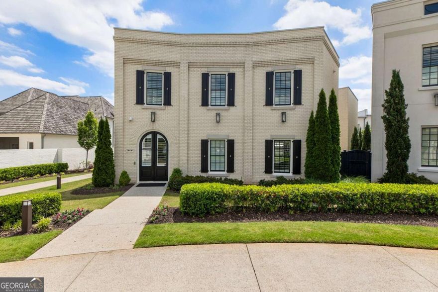 COURTYARD CALM, DOWNTOWN ENERGY     With designer touches like wide-plank white oak floors, an unbeatable location, a chefCOs kitchen outfitted with Sub-Zero and Wolf and resort-style amenities throughout, this Avalon Grand Villa defines effortless elegance.     Conveniently located in the heart of Alpharetta near the Alpha LoopCowith a quick hop to GA-400Cothis gem offers access to world-class dining, live music and boutique shoppingCowithout sacrificing privacy or peace. Start the day with a run on the Loop, pop into Whole Foods for fresh flowers and wrap up the morning with coffee in a private courtyard oasis. ItCOs resort-style living with a downtown vibe. No valet ticket needed, but bring the cars anywayCothis home comes with a three-car garage and plenty of space.     Inside, the main level commences with a bright, open-concept layout designed for effortless entertaining, enhanced by 11-foot ceilings, Mohawk-engineered white oak floors and abundant natural light. Overlooking a cozy dining area and a fireside living room, the chefCOs kitchen stuns with Sub-Zero and Wolf appliances, an oversized island for casual gatherings, sleek cabinetry and quartz countertops. A private main-level bedroom provides a quiet retreat for guests or work-from-home needs. The attached three-car garage boasts granite floors and soaring 12-foot ceilings that offer room to spareCowhether for cars, bikes, paddleboards or a fully equipped workbench and a Level 2 EV charger. Backed by a suite of behind-the-scenes upgradesColike a whole-house water filtration system, dual tankless water heaters and a brand-new HVACCothis home is as high-performing as it is beautiful.     Upstairs, the sunlit ownerCOs suite feels like a private retreat, complete with his and hers closets, dual vanities, a soaking tub and a walk-in shower designed for daily unwinding. Two spacious secondary bedrooms offer room to grow, rest or workCoeach a calm, curated space of its own. Behind the elevated finishes lies a floor plan built for real lifeCocomplete with a cozy bonus room with built-in bookshelves that invites quiet mornings, afternoon reads or an inspiring creative corner, a spacious laundry room ideal for sorting and folding and a built-in doggy room that adds both character and convenience. Welcome to a space that serves, surprises and delights. Welcome to 316 S. Esplanade.