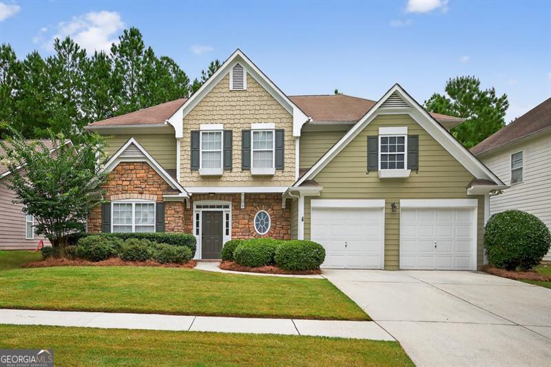 Welcome to 3010 Cooper Woods Drive in Loganville, a beautifully maintained 4-bedroom, 2.5-bath home offering approximately 2,820 sq ft of comfortable living space. Built in 2003, this home features fresh interior paint and new luxury vinyl plank flooring in the foyer, kitchen, and laundry room. The spacious primary suite includes a private sitting room perfect as a quiet retreat, library, or nursery for keeping little ones close. The inviting floor plan offers formal living and dining areas, a family room with a stone fireplace, and an eat-in kitchen. Located in a quiet, sidewalk-lined neighborhood, residents enjoy community amenities including tennis courts, an outdoor pool, and a playground-ideal for meeting neighbors or enjoying quality time with family without leaving the neighborhood. Conveniently situated near shopping, dining, and local parks such as Bay Creek Park and Tribble Mill for added outside activities. This home is also served by top-rated schools: Trip Elementary, Bay Creek Middle, and Grayson High. With its blend of style, comfort, and community, 3010 Cooper Woods Drive offers a wonderful place to call home.