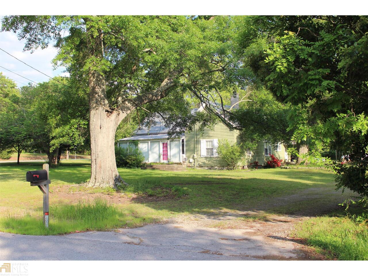 Looking for a great fixer upper, or that beautiful lot to build your dream home on? Well look no farther! This beautiful old farm house sits among 6.05 beautiful acres of green grass and mature trees. Corner lot covenant to shooing and entertainment but far enough away for peace and quiet!! Dont miss out on an opportunity to buy a tract of land this size!!