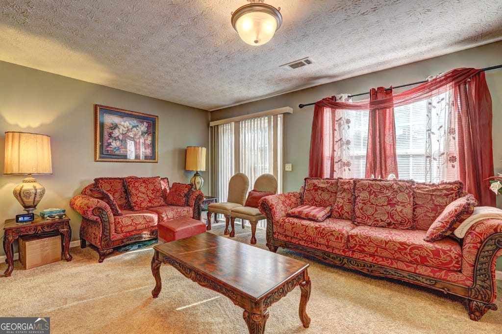 Photo of 1015 Magnolia Gardens Walk, McDonough, GA 30253 (MLS # 10821970)